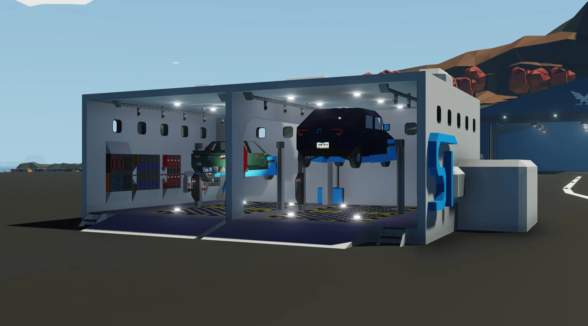 A service center's two car lifts, with a SentyTek Aita on one of them